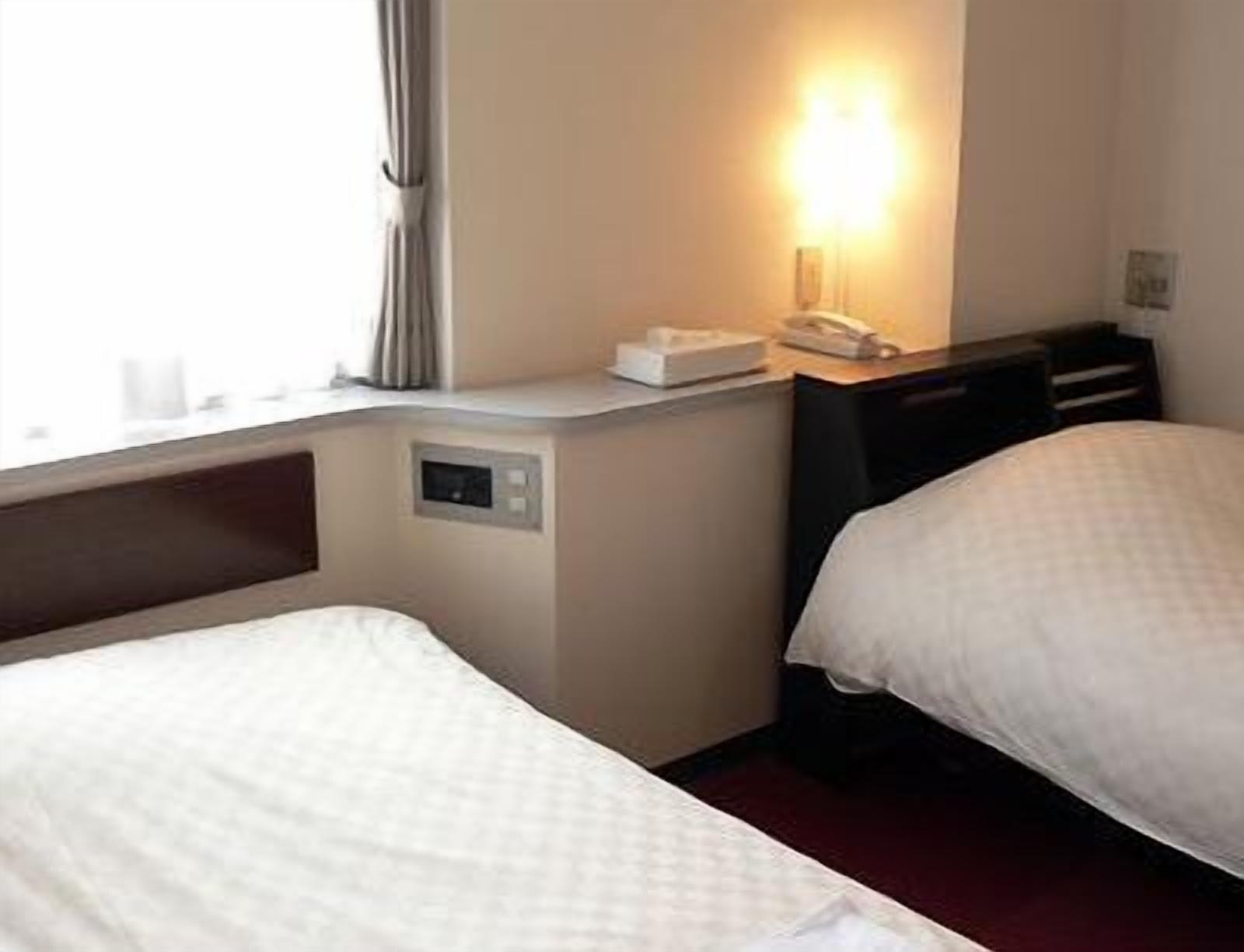 Hotel Livemax Budget Iyo Mishima Shikokuchuo Eksteriør billede